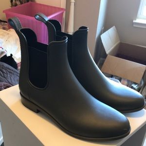 Green rain boots